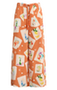 Orange pants with a colorful pattern on a white background