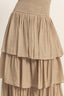 Beige tiered skirt on a plain background