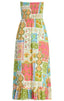 Colorful patchwork dress with floral and geometric patterns on a white background