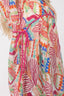 Colorful patterned dress with a pink belt on a white background