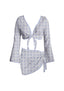 Two-piece swimsuit with floral pattern on a white background