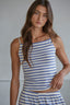 Woman wearing a striped tank top 