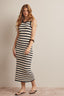 Woman wearing a navy and white striped crochet midi dress