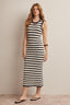 Woman wearing a navy and white striped crochet midi dress