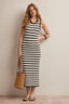 Woman wearing a navy and white striped crochet midi dress