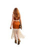 A woman walking away from the camera at an outdoor music festival, wearing a rust-orange sleeveless dress with a cream fringe hem and carrying a patterned shoulder bag.