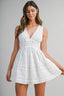 Eyelet Deep V Neckline Front Bow Smocked Back Mini Dress
