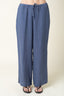 Blue wide-leg pants with a drawstring waist on a white background