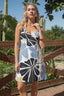 Printed Sleeveless Mini Dress. Open Back with tie and invisible zip closure.