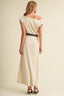 Close-up detail of the Soleil Cowl Neck Belted Maxi Dress showing the draped asymmetrical cowl neckline cascading over one shoulder and the removable brown faux-leather belt with gold-tone rectangular buckle against the sueded cream knit fabric