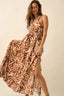 Woman wearing a patterned dress with a beige background