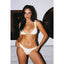 Woman wearing a yellow bikini standing against a neutral background