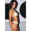 Woman wearing a beige bikini against a neutral background