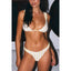 Woman wearing a yellow and white striped bikini against a neutral background