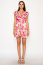 Woman wearing a floral dress on a white background