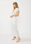 Woman wearing a floral dress on a white background