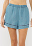 Blue denim shorts with embroidery on a white background