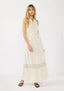 Woman wearing a long white dress on a white background