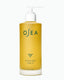 Yellow bottle of OSEA undaria algae body oil on a white background