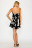 Geometric black dress with white detailing