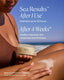 Woman applying OSEA body butter on her arm with a scenic ocean background