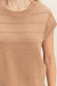 Close-up of a beige knit sleeveless top on a neutral background