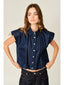 Woman wearing a dark denim shirt with a plain background
