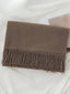 Brown scarf with fringes on a white background