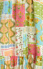 Patchwork fabric with colorful floral and geometric patterns