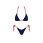 Navy blue bikini with red straps on a white background