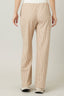 Beige striped pants worn by a person on a plain background