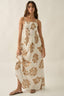 Woman wearing a floral dress on a plain background
