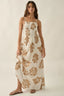 Woman wearing a floral dress on a plain background