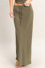 Olive green patterned maxi skirt on a plain background