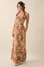 Woman wearing a floral dress against a beige background