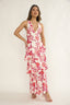 Woman wearing a floral dress on a white background