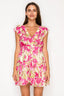 Woman wearing a pink floral dress on a white background