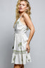 White boho a-line mini dress with green palm tree detailing 